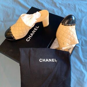 Authentic Chanel sandals with box and bag, beige and black in front for woman